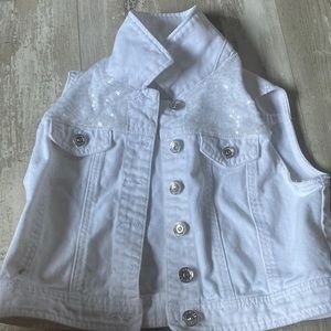 White jean vest with sequins on the top sides. Never been worn literally new. 💫